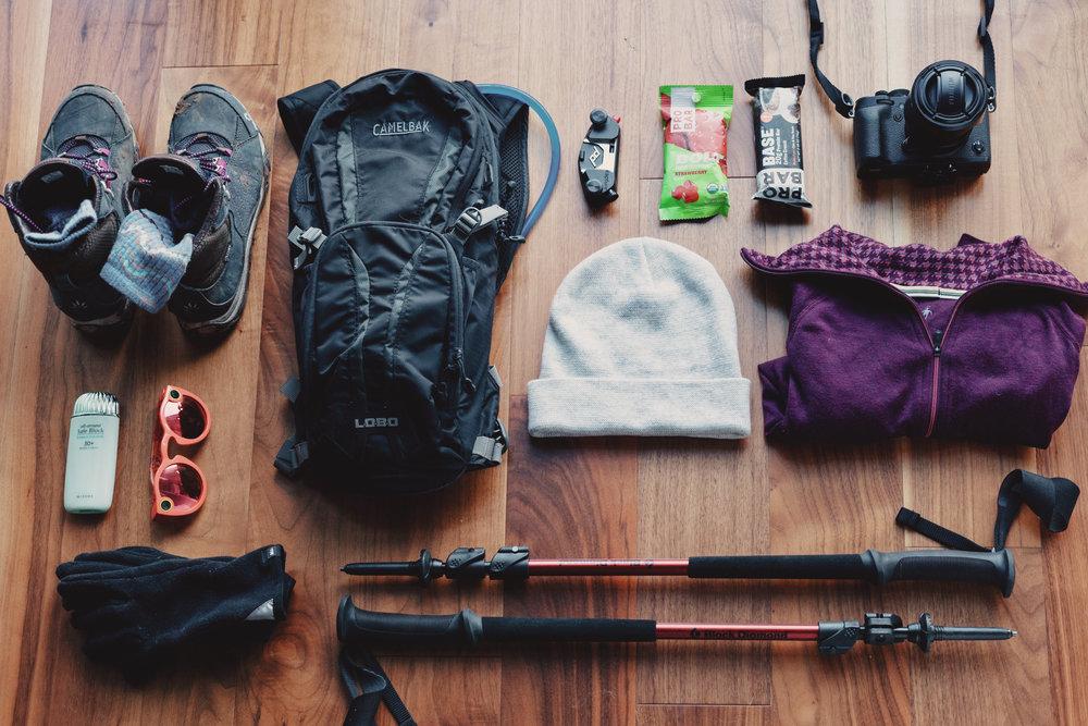 Gorilla trekking gear including boots gloves and rain jacket