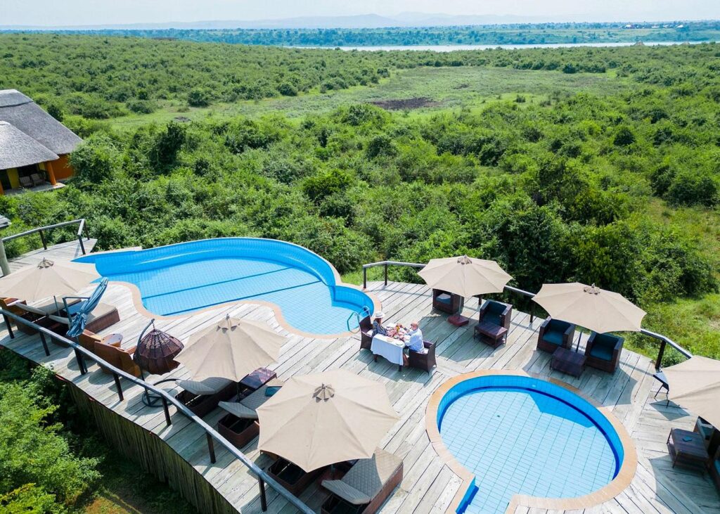 Luxury safari travellers in Uganda national park