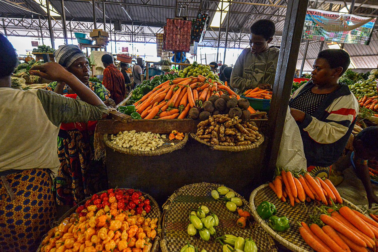 Vendors selling fresh fruits and vegetables